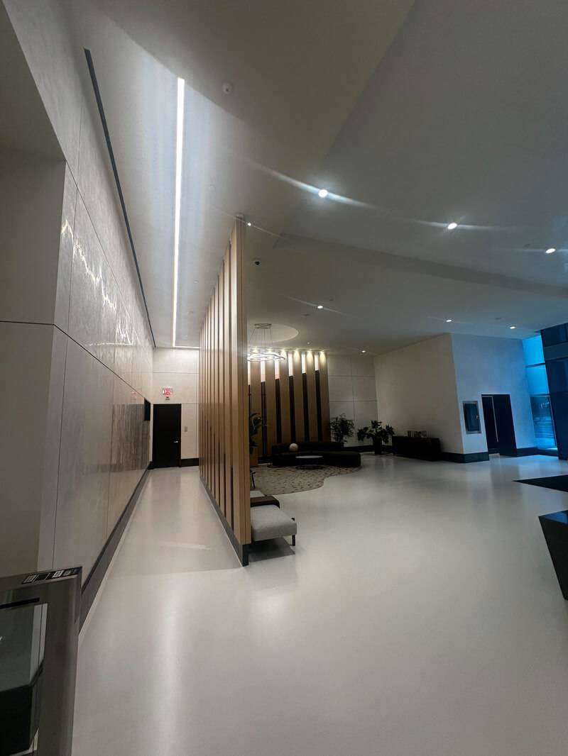 Lobby at 3901 N Fairfax finished in acoustic plaster White 001 and decorative plaster JC 45