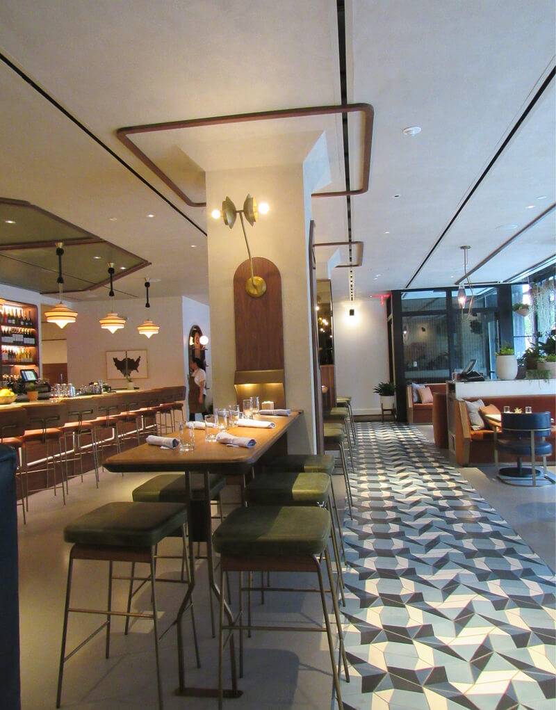 Eaton Hotel & Cafe dining room with decorative plaster walls, ceiling and columns