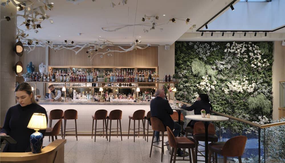 Hotel bar wall finished in hand-applied plaster
