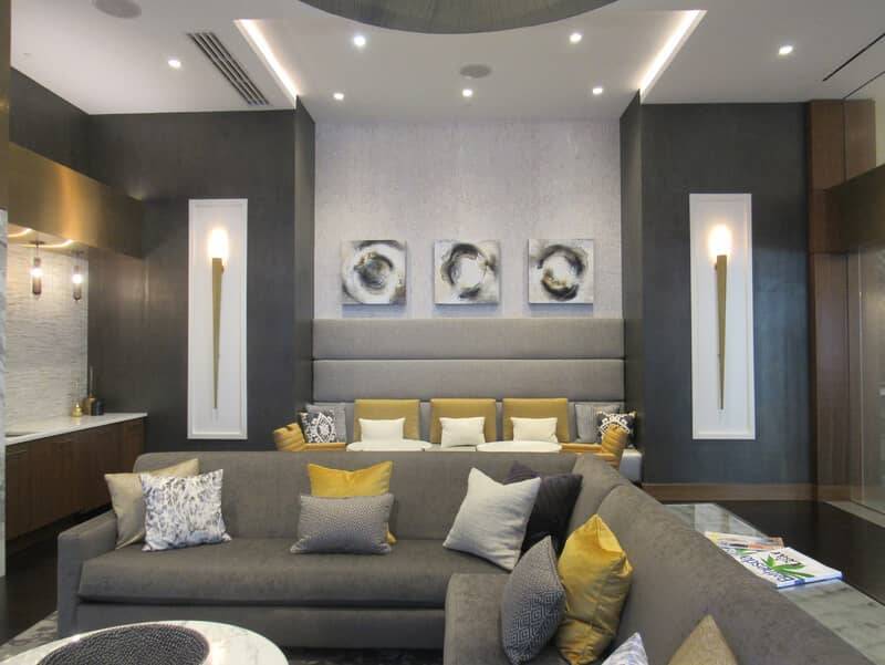 Cheval Condos living room in Bethesda with pitted plaster walls and combed perlata side panels